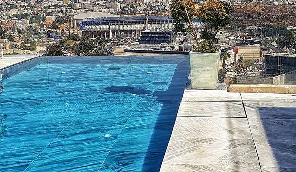 תכנון בריכת שחייה מעוצבת מול אצטדיון טדי